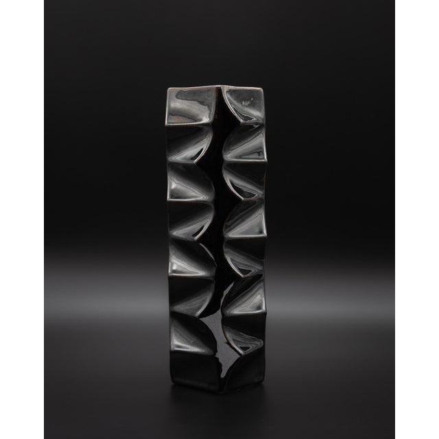 A striking porcelain vase from the archais series designed by heinrich fuchs for hutschenreuther, produced in germany...