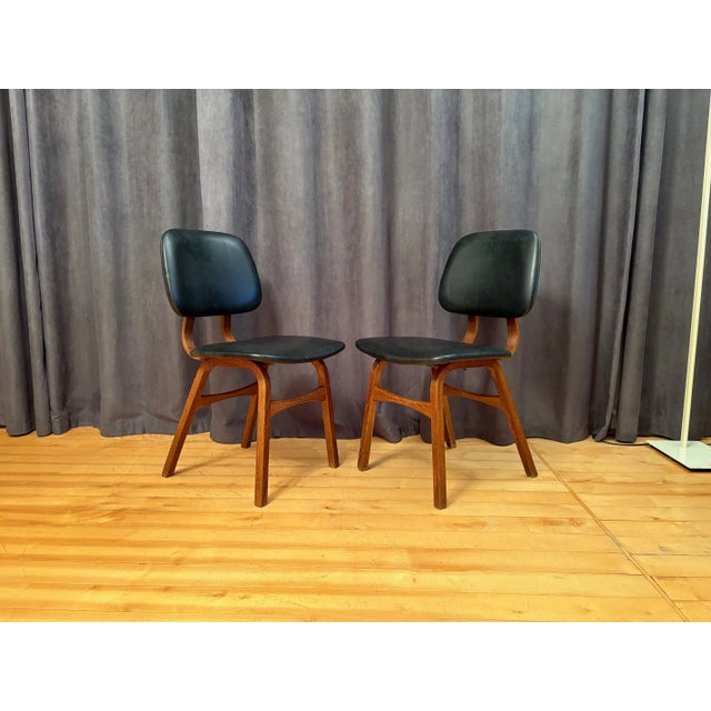 Pair of Borge Mogensen-style chairs, Denmark, 1960s. In good original condition. Minor cracks in the original faux...