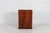 The chest of drawers with numerous drawers for storage is mainly made of walnut with pine inside. It was made around 1920...