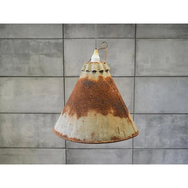 The lamp was made in the 1950s, industrial style. It is made of grey metal with visible rust. Condition: The lamp has been...