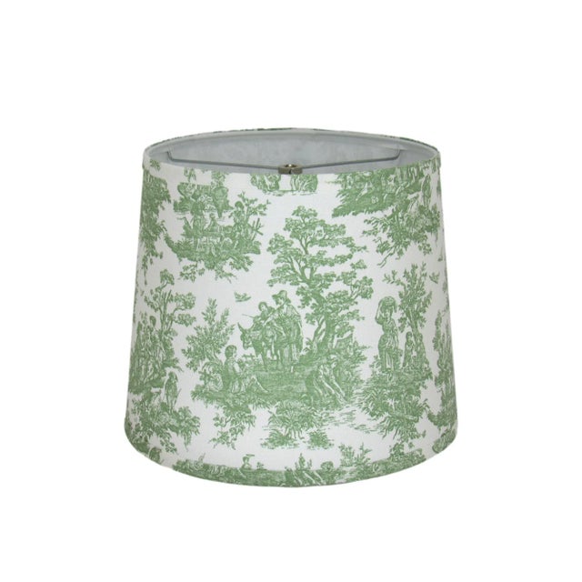 This sage green toile drum shade features a charming pastoral design, evoking the elegance of classic French country...