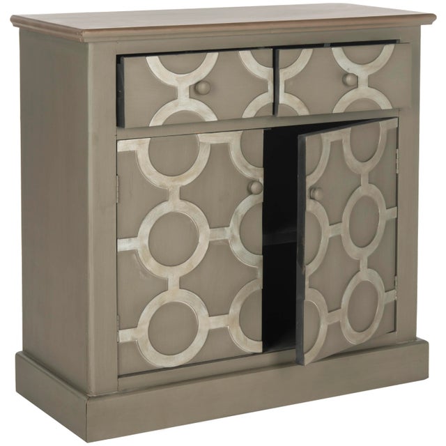 The artful chest by features a graphic chain link motif to spark up it's classic lines.Crafted of firewood in a grey...