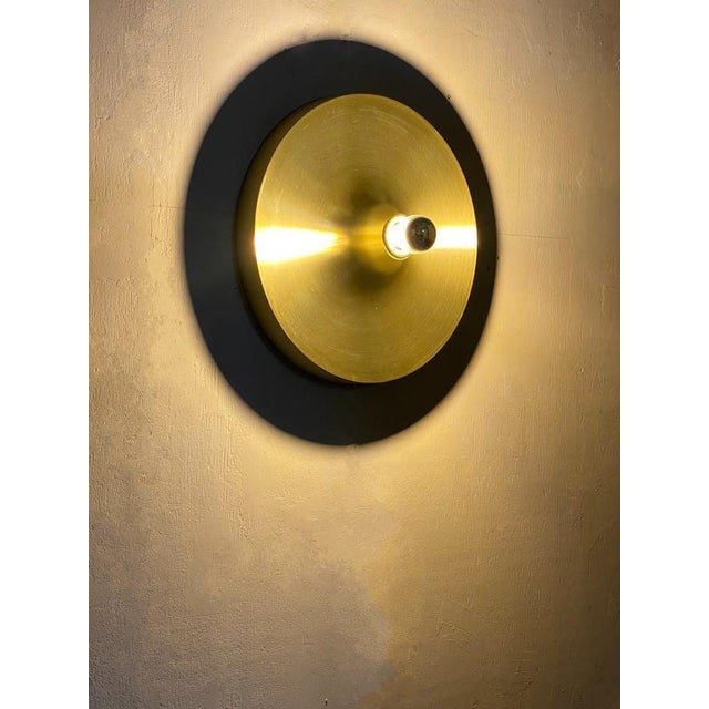 Elevate your interior with this stunning vintage wall disc lamp by cosack leuchten, a true gem from the 1970s. This...