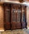 Late 19th Century Monumental Carved Walnut English Victorian Two Piece Breakfront Bookcase For Sale - Image 5 of 9