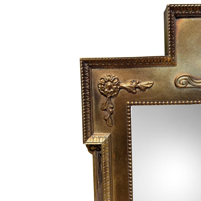 An elegant vintage neoclassical giltwood and composition pier or mantel mirror, dating to the latter half of the 20th...