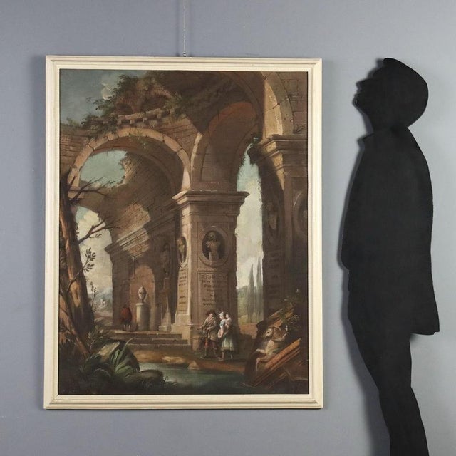 Oil on canvas. Emilian school, first half of the 18th century. The imposing ruined architectural structure, a vestige of...