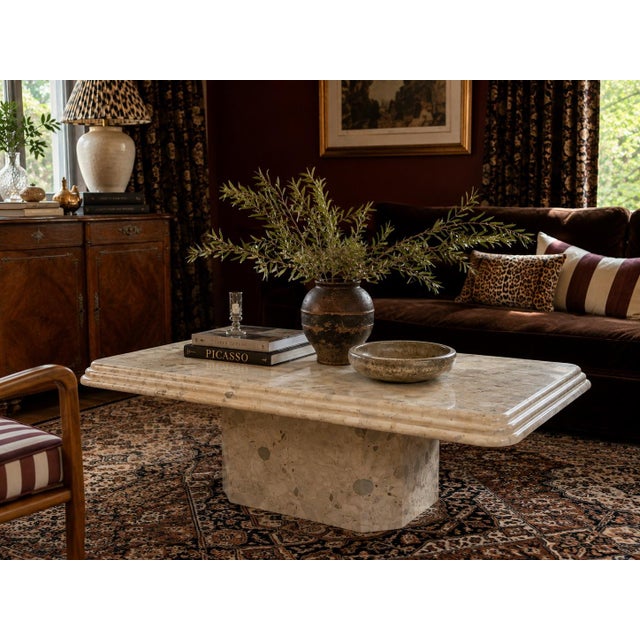 This striking vintage pedestal coffee table brings serious sculptural presence to a room. Featuring a substantial...
