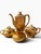 Exquisite vintage four-piece tea and coffee service by Wheeling Decorating Co., featuring the highly decorative “Doves,...