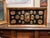 Rich arrangement with classical gilded plaster cameos representing classical characters, emperors and architectural and...