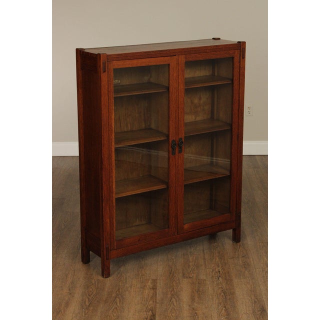 High Quality Antique Early 20th Century Oak Display Bookcase with Pair of Glazed Doors Opening to Adjustable Wooden Shelves