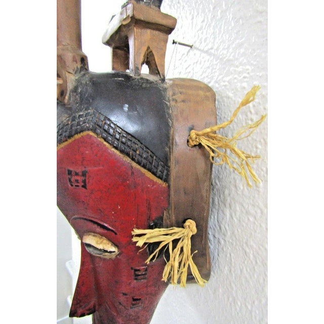 Antique Hand-Carved Guro Mask of the Ivory Coast Featuring a Seated Figure For Sale - Image 14 of 15