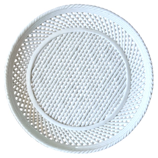 Beautiful set of four handmade porcelain plates, crafted in Italy, featuring an elegant lattice weave design with a raised...