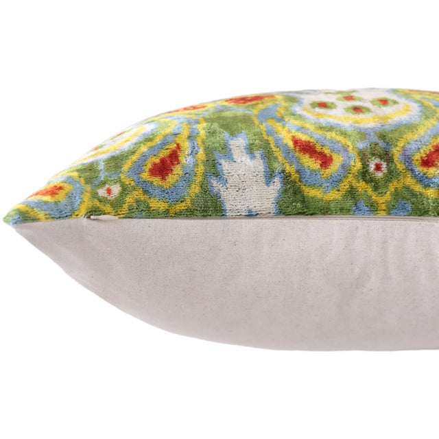 "Vibrant, artistic, and undeniably luxurious, this handmade silk velvet pillow captures the spirit of historic Central...