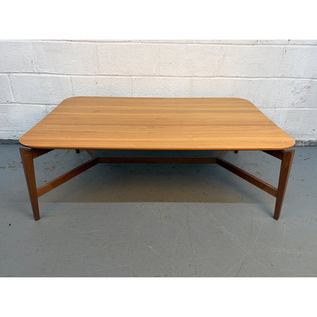 A beautifully designed mid-century modern coffee table by Calligaris of Italy, showcasing clean lines and refined Italian...