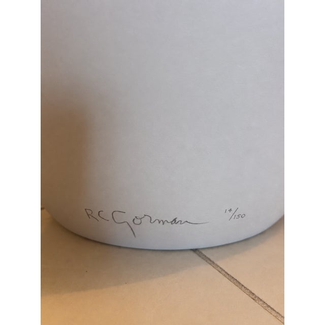 Striking limited-edition ceramic vessel by celebrated American artist R.C. Gorman (1931–2005), known for his distinctive...