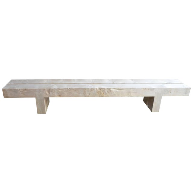 Impressive reclaimed bleached teak wood log bench. Perfect for inside or outside living. The two top pieces rest on a...