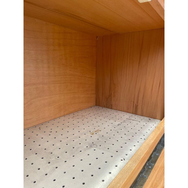 This vintage sideboard was produced in Czechoslovakia in the 1970s and showcases the functional modernist design typical...