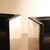 Curated pair of cubic armchairs featuring a striking architectural design. According to the previous owner, these chairs...