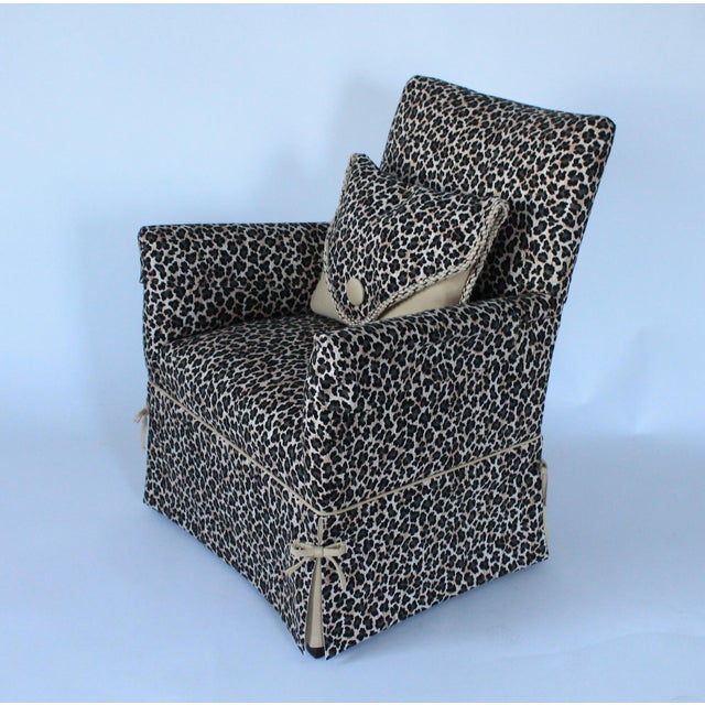 Vintage petite custom upholstered animal print arm chair. Features dainty little bows on each corner. Includes one envelop...