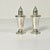 A lovely set of weighted Sterling Silver Salt and Pepper Shakers. They have glass liners and rope edges along the bottom...