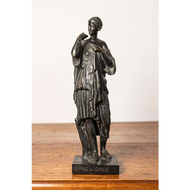 This exquisite 19th-century French bronze sculpture, titled Diane de Gabie, showcases the elegance and refinement of...