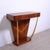 Elegant and particular wooden console, design and production of the 1950s, the style is very reminiscent of that of Paolo...