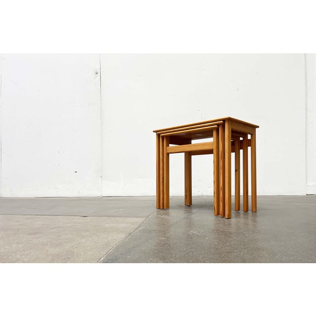 Nesting tables by the Finnish manufacturer Asko. This is a rare pine version. A rustic yet light design. The construction...