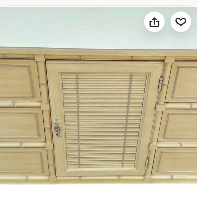 9-Drawer Henry Link Bali Hai style triple dresser chest in very good clean vintage condition. Louvered center door opens...