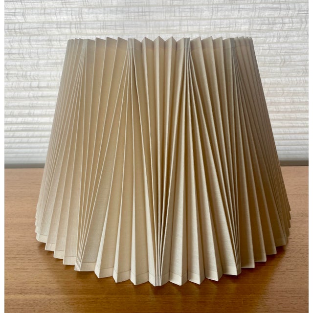 Excellent midcentury/ postmodern shade by famous maker. Measures 10.75" tall with a top diameter of 10.5" and a base...
