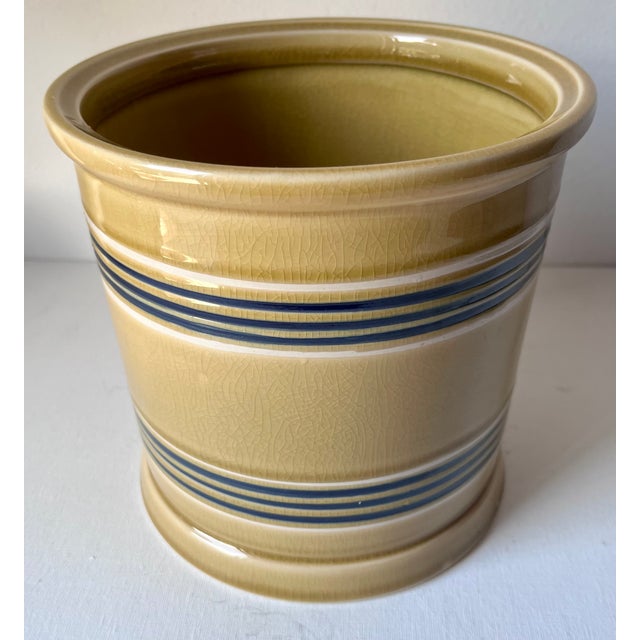 This wonderful Yellow ware Blue banded classic canister can be used for a cookie jar or to store coffee or flour, etc., or...
