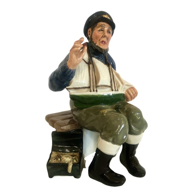 This classic Royal Doulton porcelain figurine titled "Tall Story" celebrates the timeless tradition of seafaring folklore....