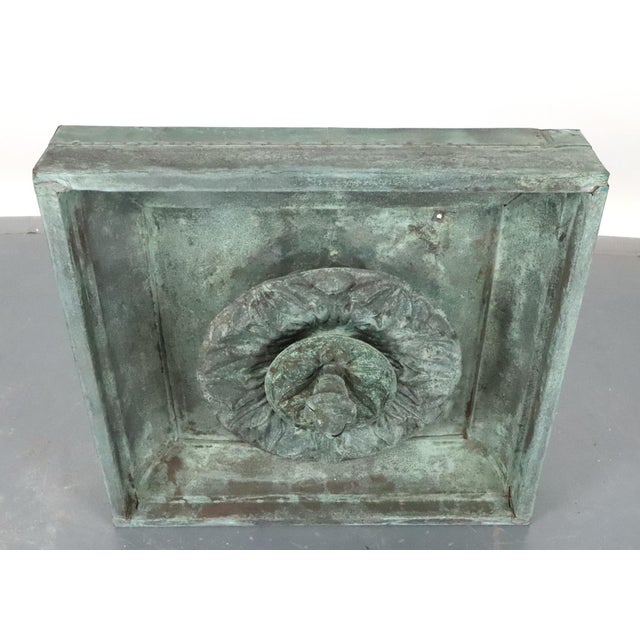 Early 20th century reclaimed copper architectural building rosette mounted to a wooden frame to make a unique wall art...