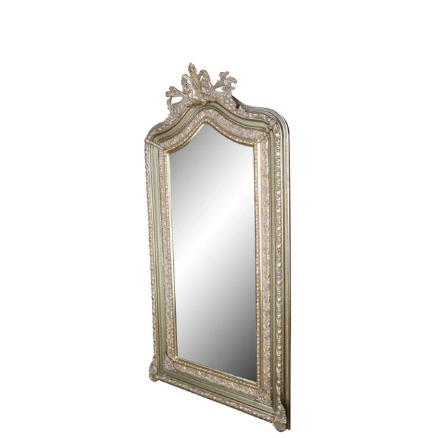 An exceptional late 20th century French Baroque style pier / dressing mirror. Features a pine giltwood frame with a tall...