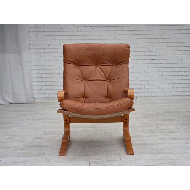 1970s, Norwegian armchair, model "Kengu". Original beige furniture leather, bent wood, canvas. Original very good...