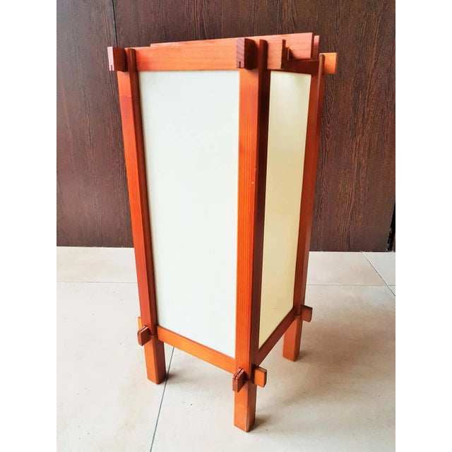 Danish table lamp or floor lamp from the 1960s. Straightforward Scandinavian design made of wood and Acrylic glass....