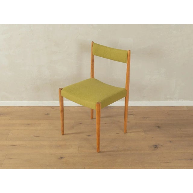 Classic dining room chairs from the 1960s. Solid cherry wood frame. The chairs have been reupholstered and covered with a...