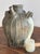 This rare 18th century walnut oil jug is a quietly striking example of early utilitarian pottery, shaped by hand and...