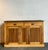 Discover the charming allure of this vintage Boho Chic pine sideboard, a rustic and functional piece dating from the early...