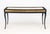 Koket "Exotica" Dressing Table, brass inset top surrounded by faux snakeskin above four drawers and four tapered legs,...