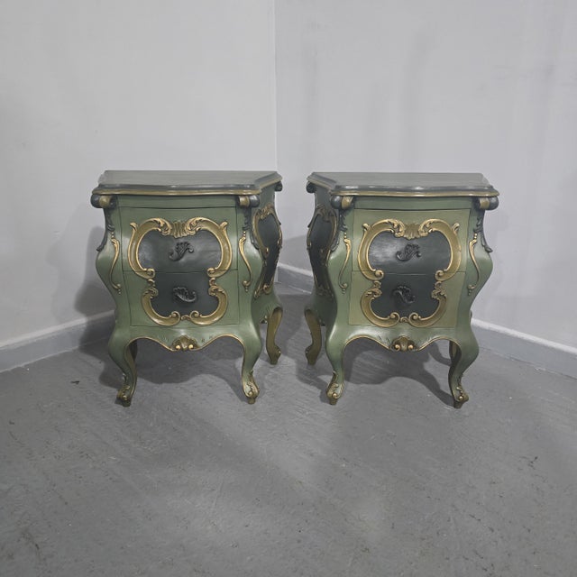 A superb pair of bombe shaped two drawer painted chests of drawers, partial gilded, in excellent overall condition. 25.5"...