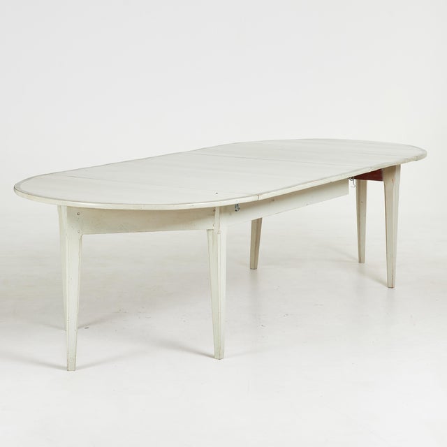 Crescent-shaped consoles with inlays in various sizes transform into a stunning dining table. Flexible sizes are possible...