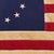 This vintage Betsy Ross American flag is made from a cotton cloth, with fully sewn stripes and 13 embroidered stars....