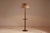 A superb French floor lamp from the 1930s, remarkable for its finely sculpted column with a continuous twist, inspired by...