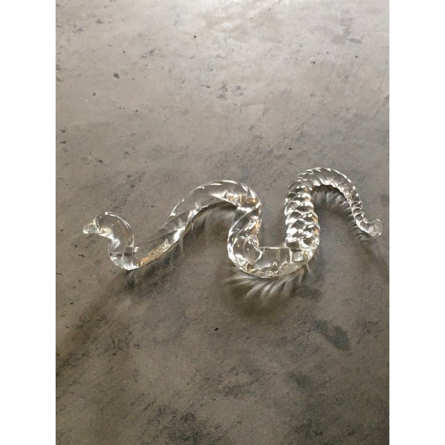 Artist blown glass snake objet... great atop a stack of books.