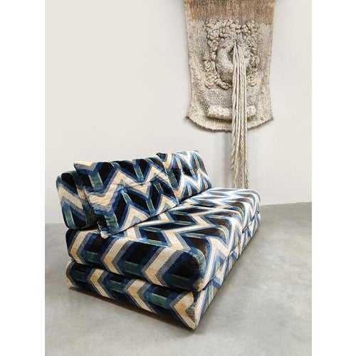 Geometric patterns. What a real eye-catcher is this fantastic vintage two-seater sofa, lounge chairs, and daybed all in...