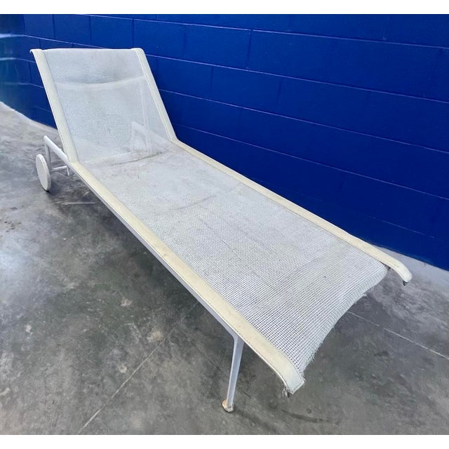 Vintage Outdoor Adjustable Pool Chaise Lounge with wheels and adjustable upper headrest. Powder coated frame with mesh...