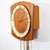 Teak wall clock by Brixon. Comes with weights as well as original pendulum and offers a chime. May need to be serviced or...