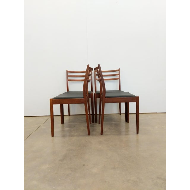 Set of 4 authentic vintage mid century modern dining chairs. Designed by Victor B Wilkins for G Plan. Maker's label on...