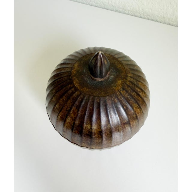 Late 20th-century lidded canister or box made of bronze verdigris-finished metal. Features a traditional melon or gourd...