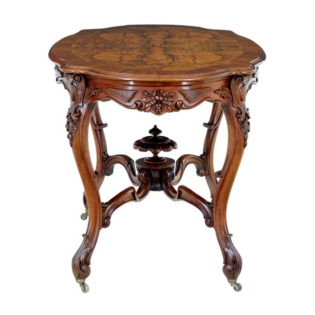 19th century carved walnut occasional table circa 1890. Fine quality rococo revival swedish made table. Dimensions of this...